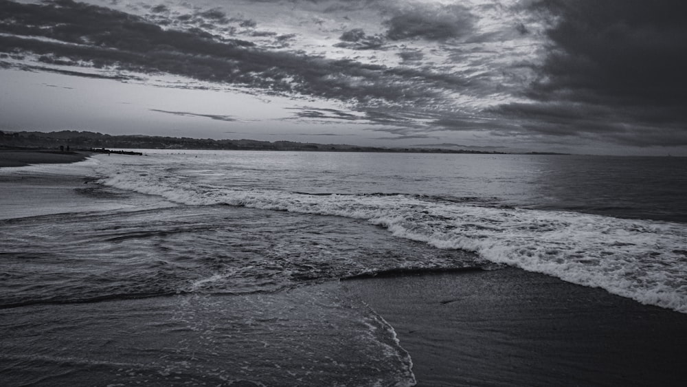 a black and white photo of the ocean