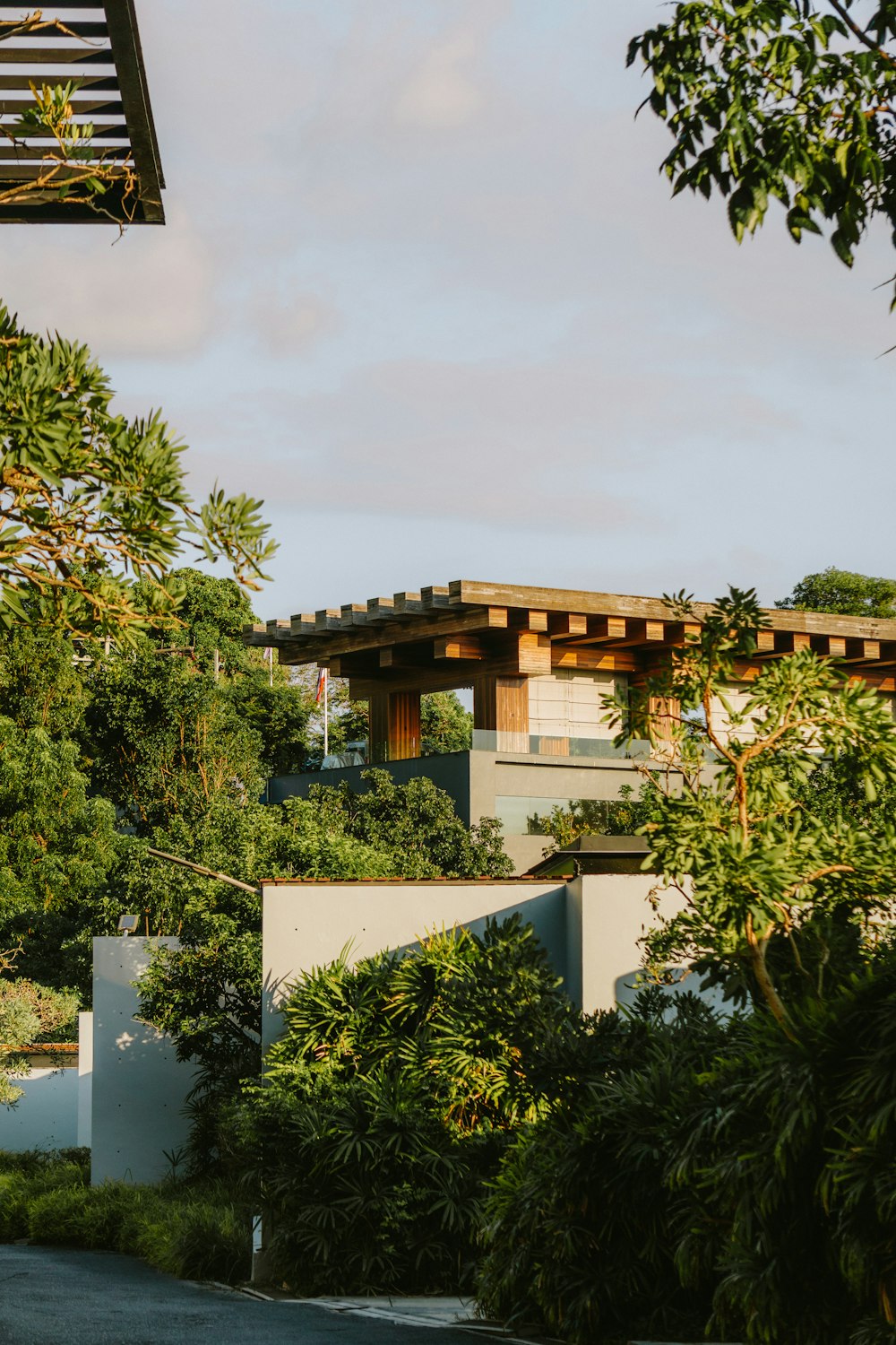 a view of a house through the trees