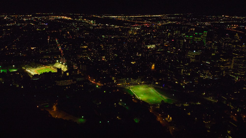 a view of a city at night from a plane