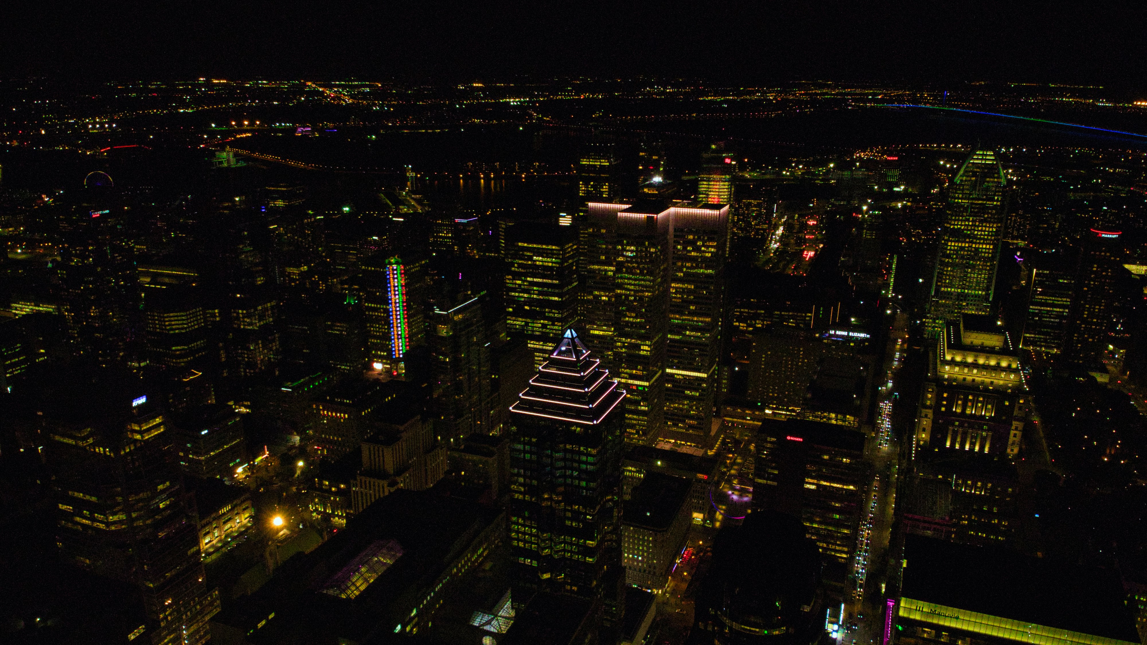 an aerial view of a city at night