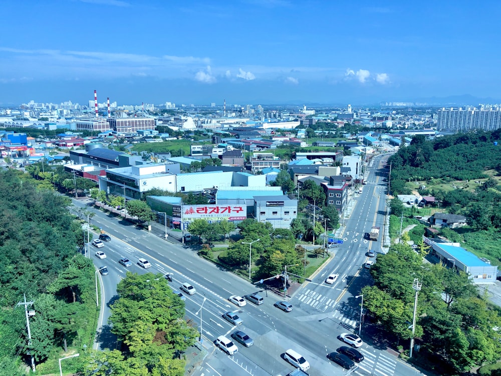 an aerial view of a city with a lot of traffic