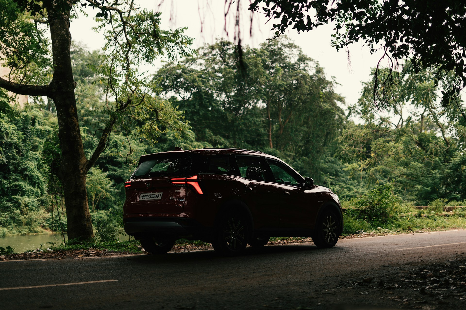 a car is parked on the side of the road