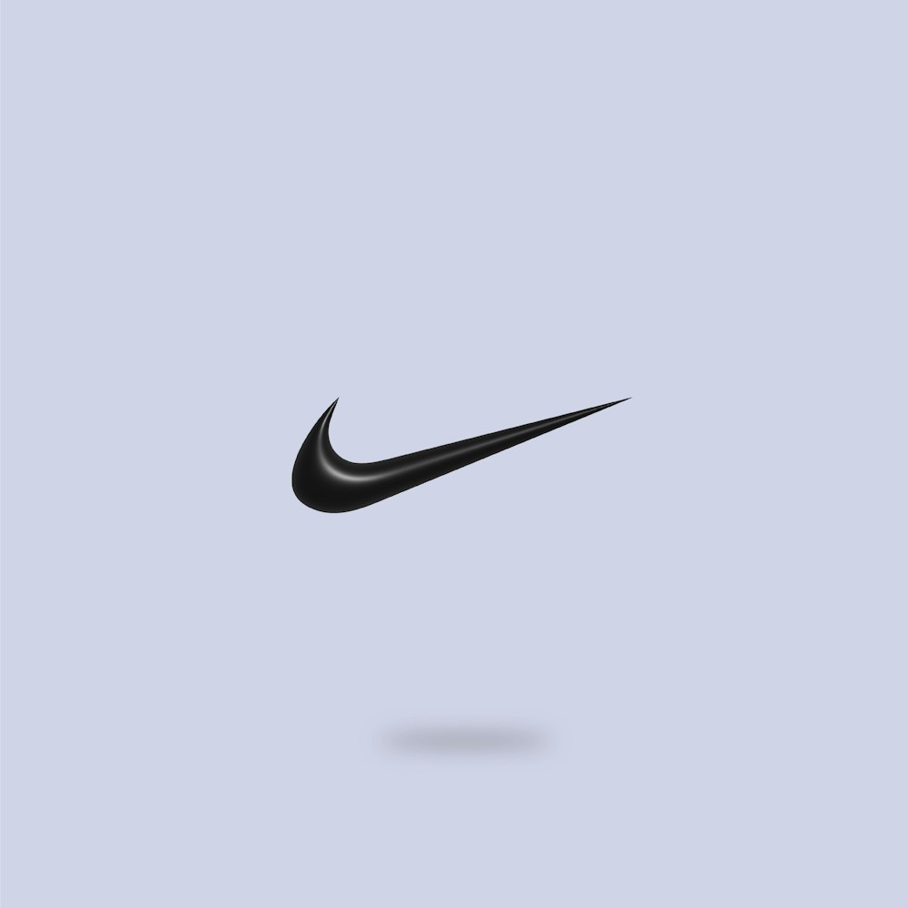 a black nike logo on a blue background