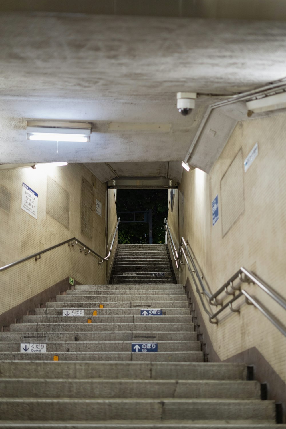 a set of stairs leading up to the top of a flight of stairs