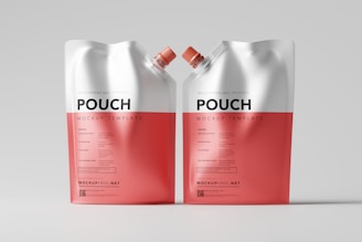 two pouches of coffee on a white surface