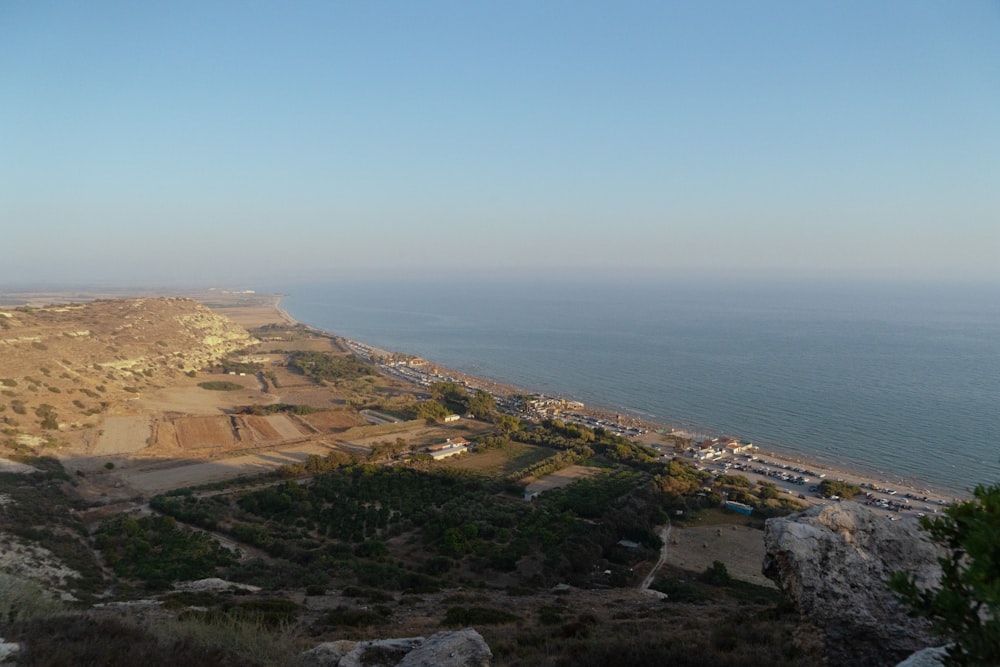 a view of a beach from a hill