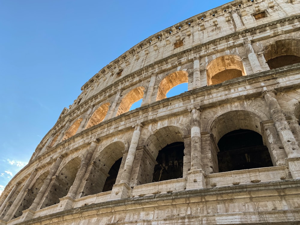 a close up of the side of an ancient building