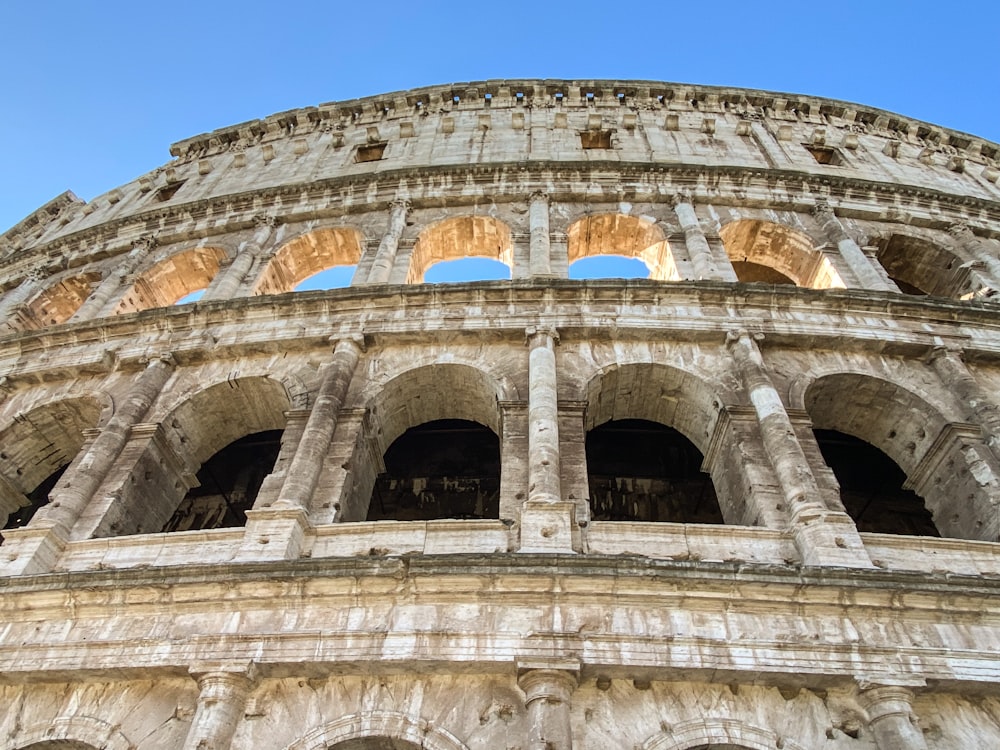 a close up of the side of an ancient building