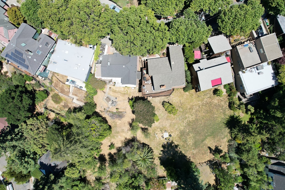 a bird's eye view of a neighborhood with lots of trees