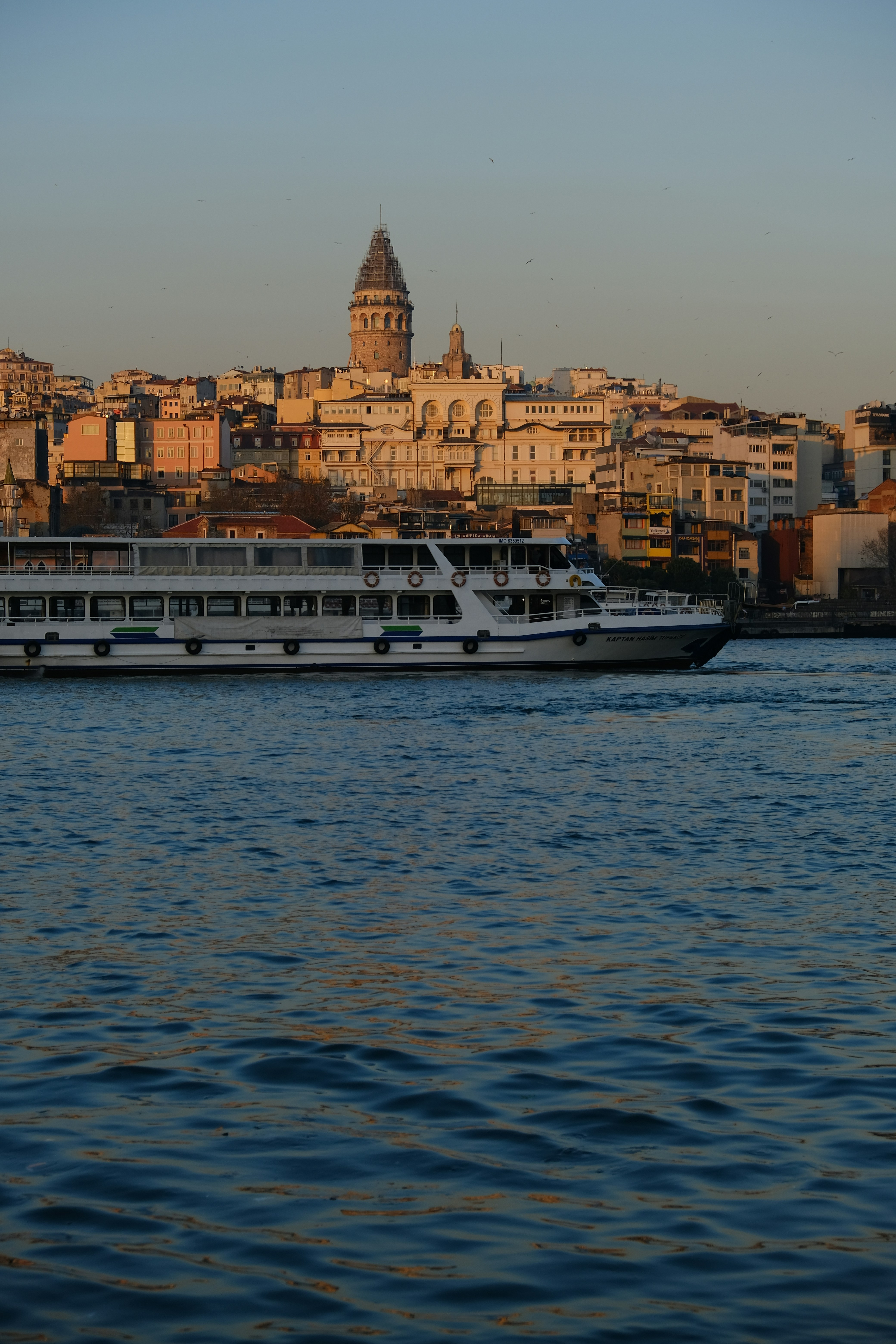 a large white boat in a large body of water