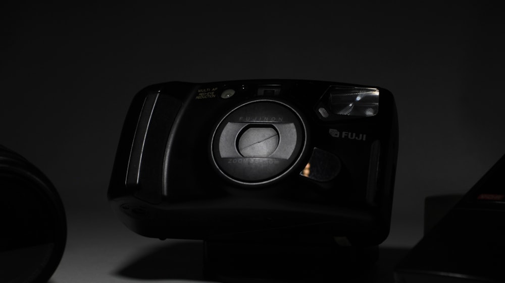 a close up of a camera in the dark