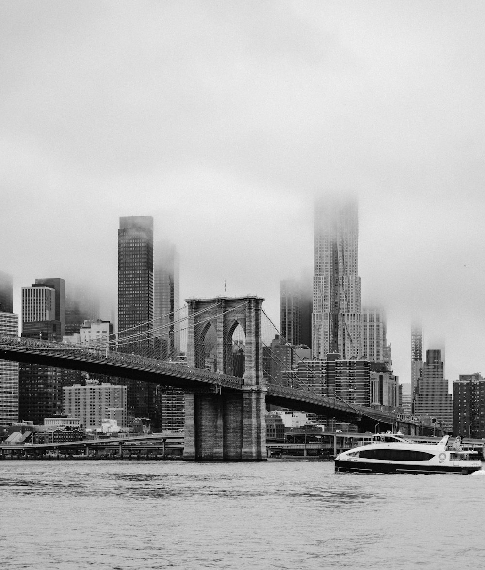 a black and white photo of a boat in the water