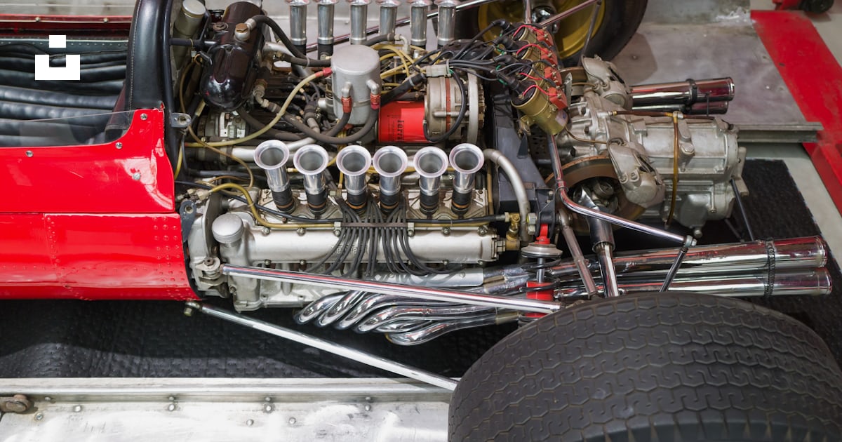 A close up of a red race car engine photo – Free Deutschland Image on ...