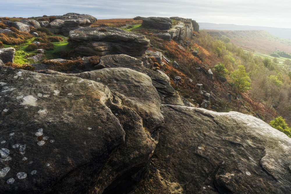 a view of a rocky outcropping in the countryside