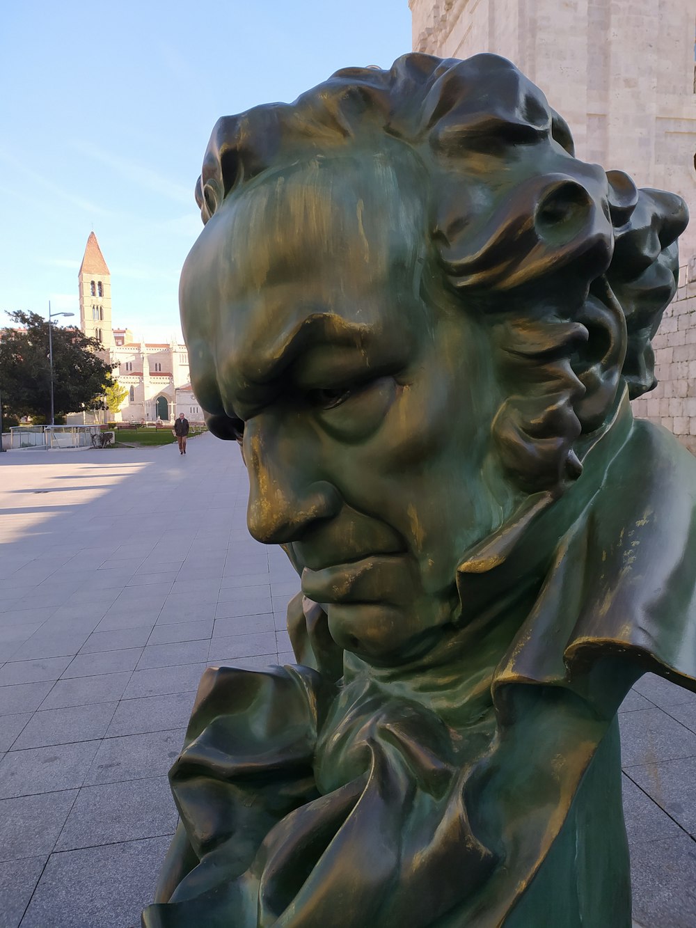 a close up of a statue of a man's face