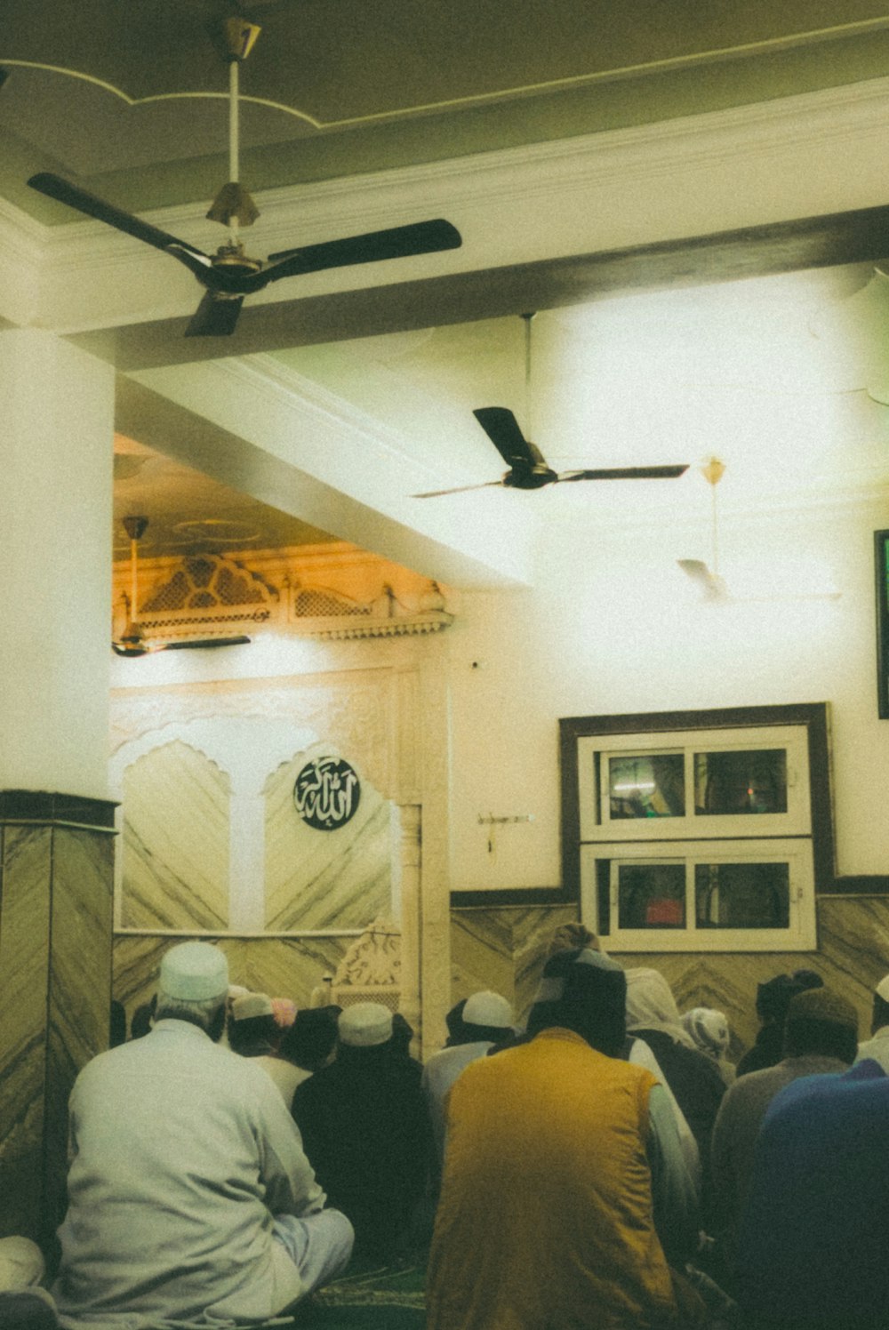 a group of people sitting in a room