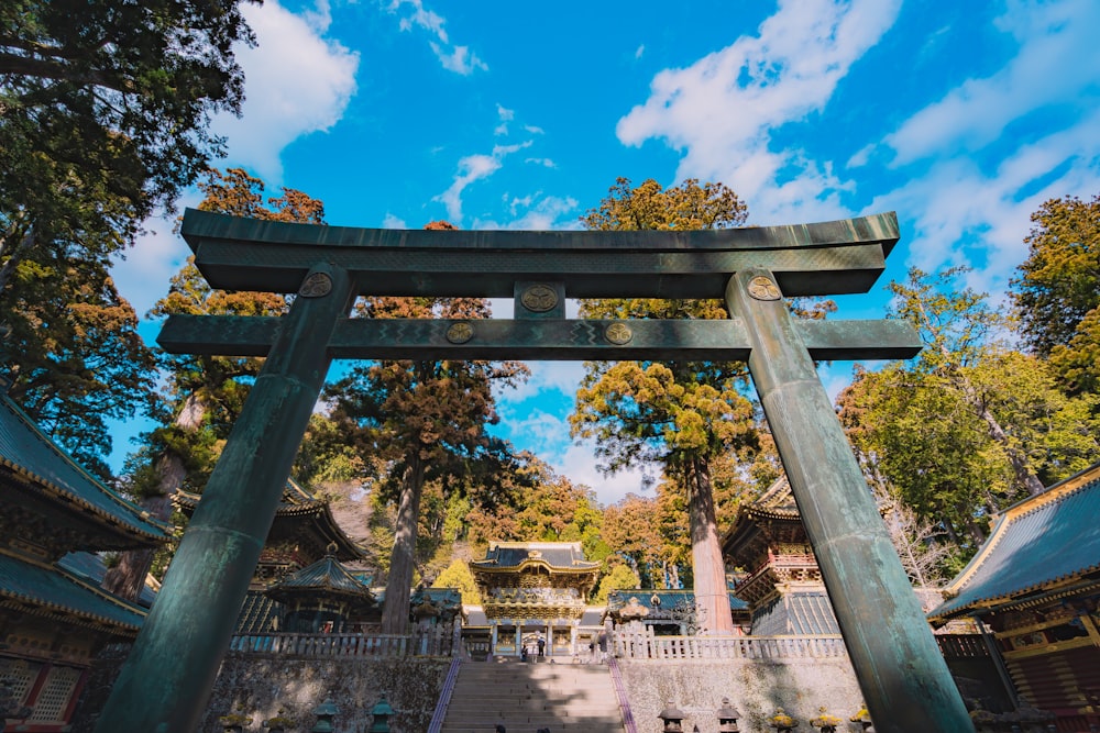 a very tall wooden structure with a sky background