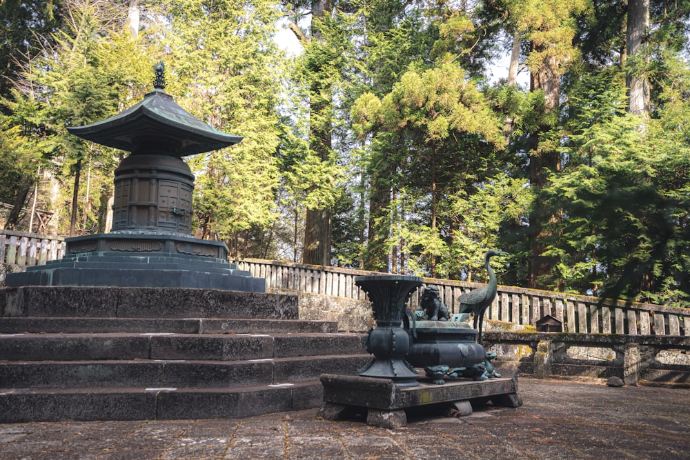 a statue in the middle of a park