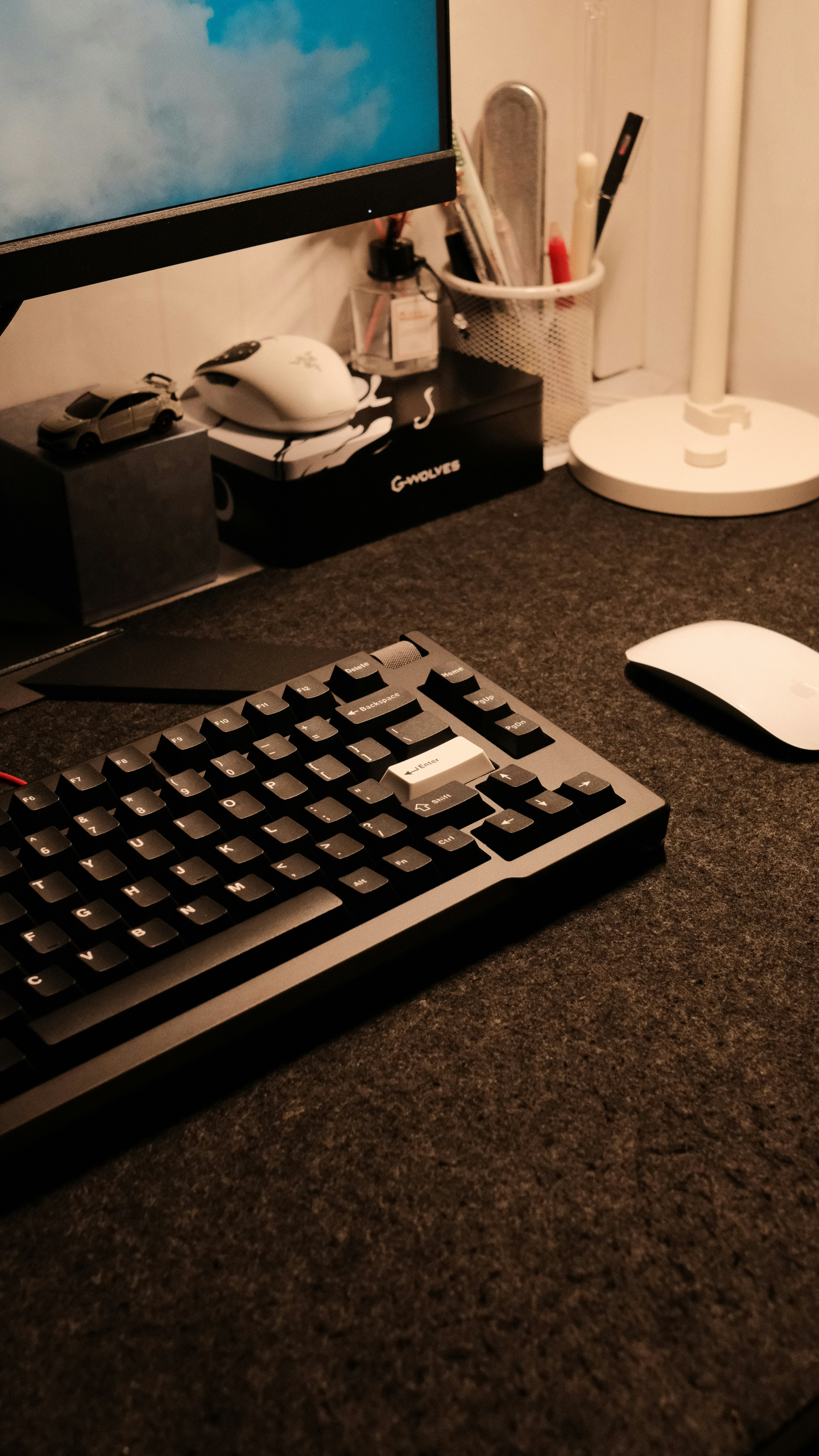 a computer keyboard sitting on top of a desk