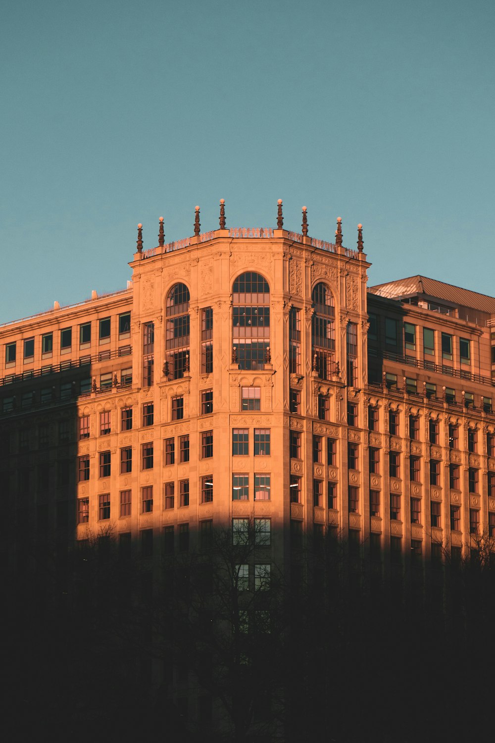 a large building with a clock on the top of it