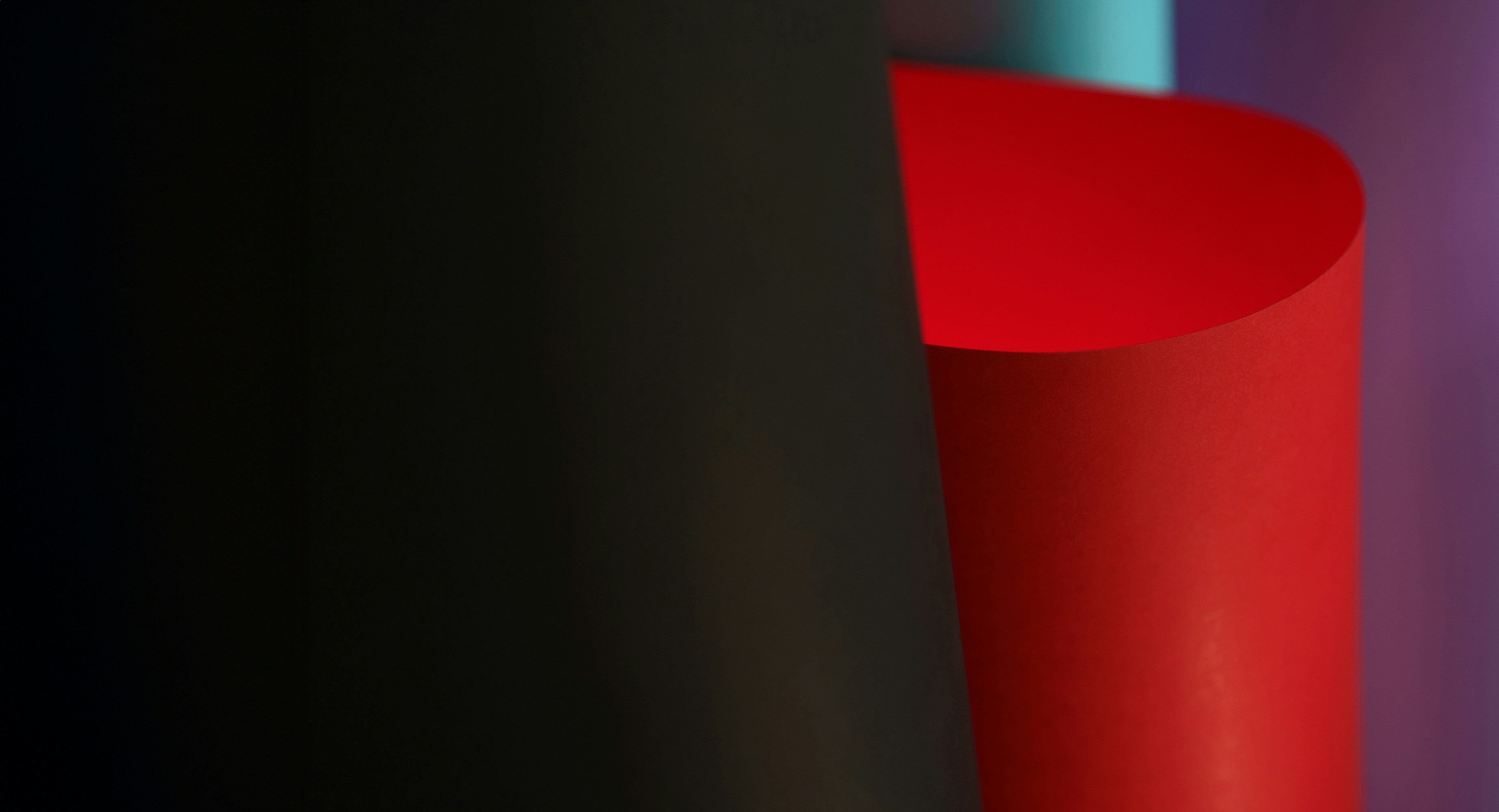 a close up of a red object in a room