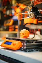 a 3d printer with a skull on top of it