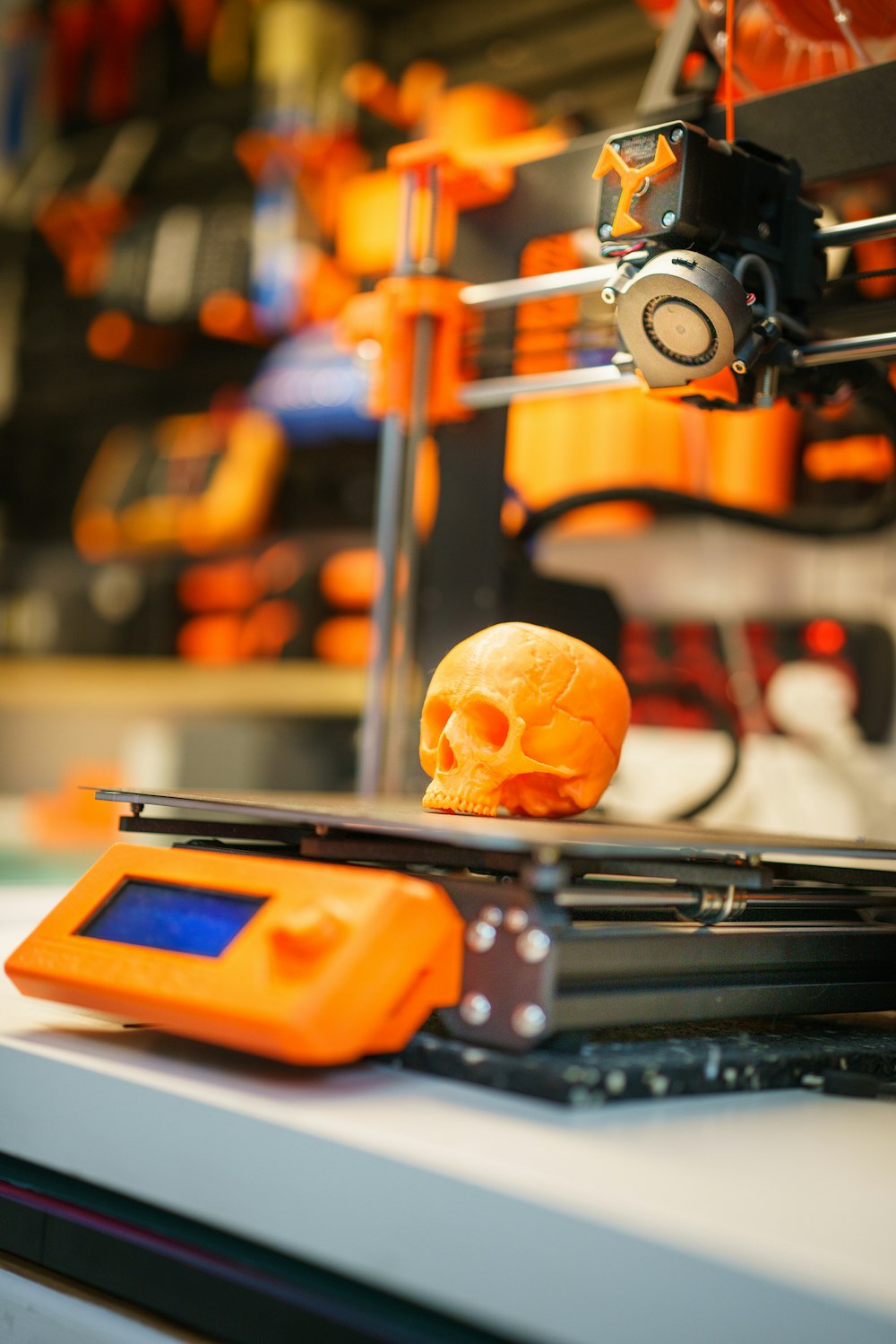 a 3d printer with a skull on top of it