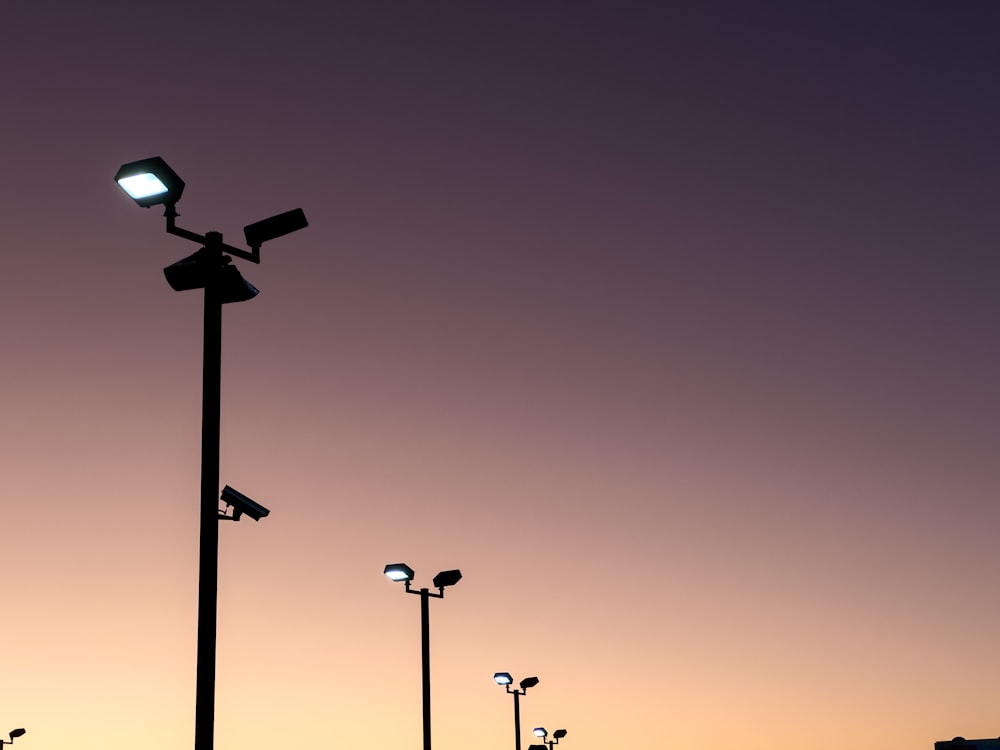 a couple of street lights sitting next to each other
