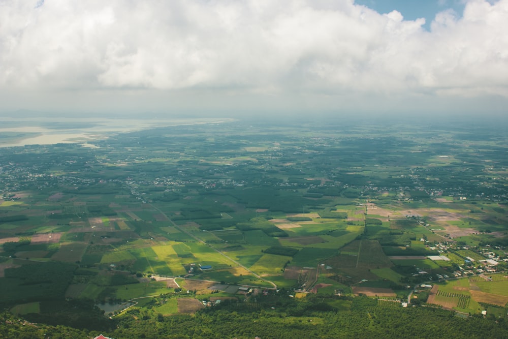 an aerial view of a rural area with green fields