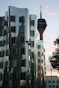 a tall building with a tower in the background