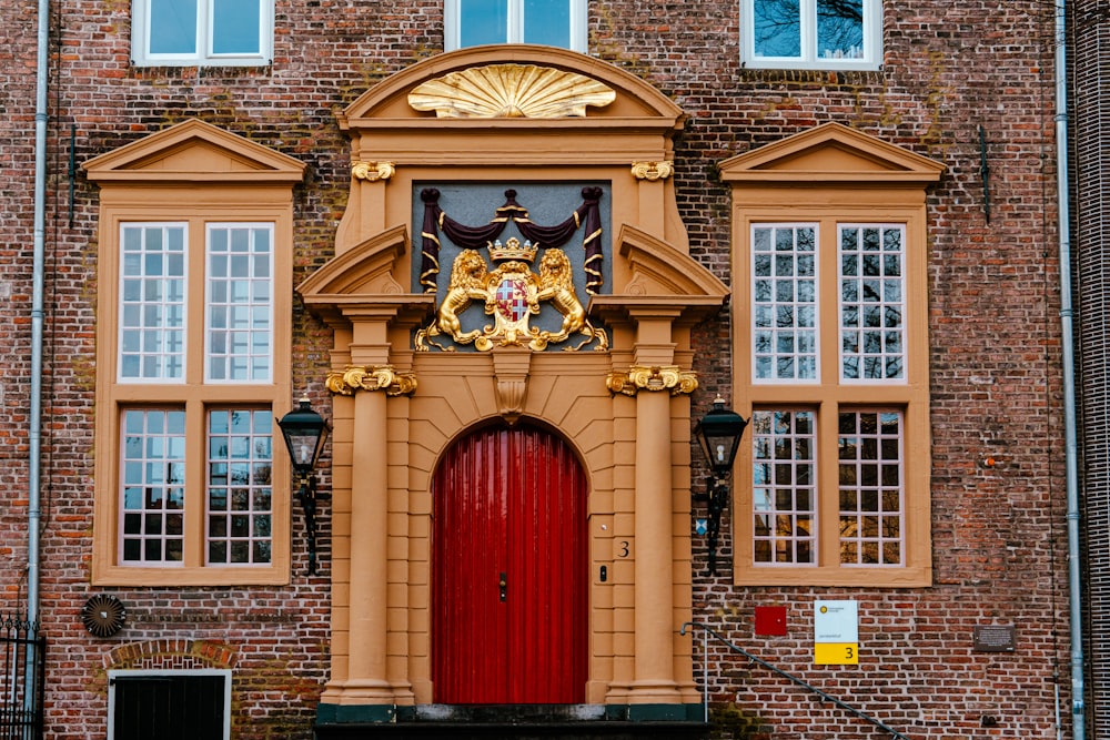 a building with a red door and a red door