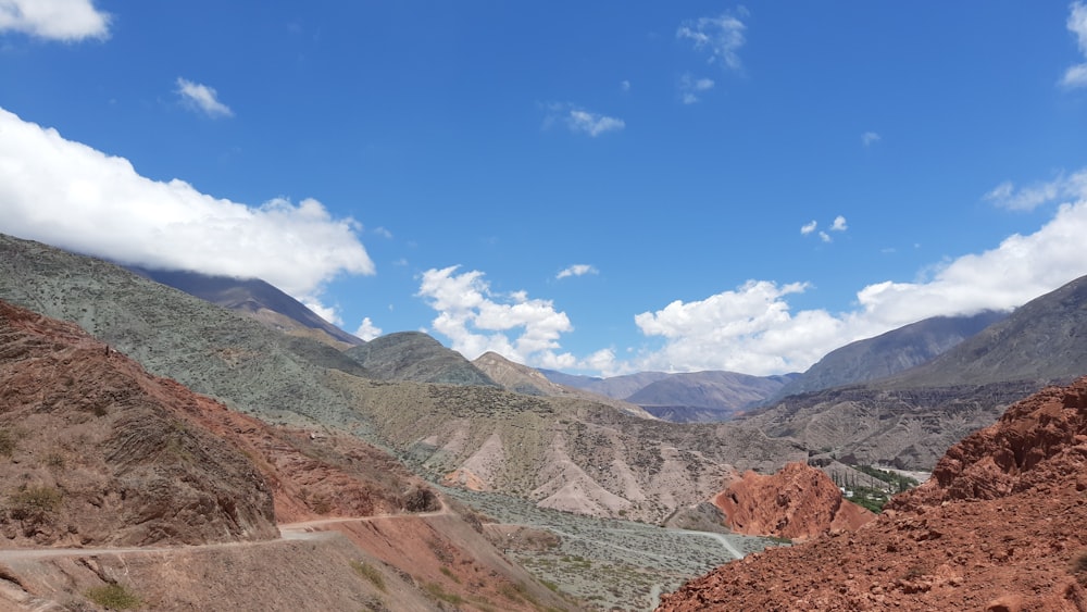 a scenic view of mountains and a river