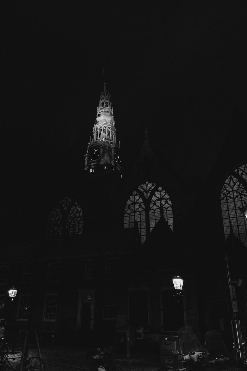 a black and white photo of a clock tower