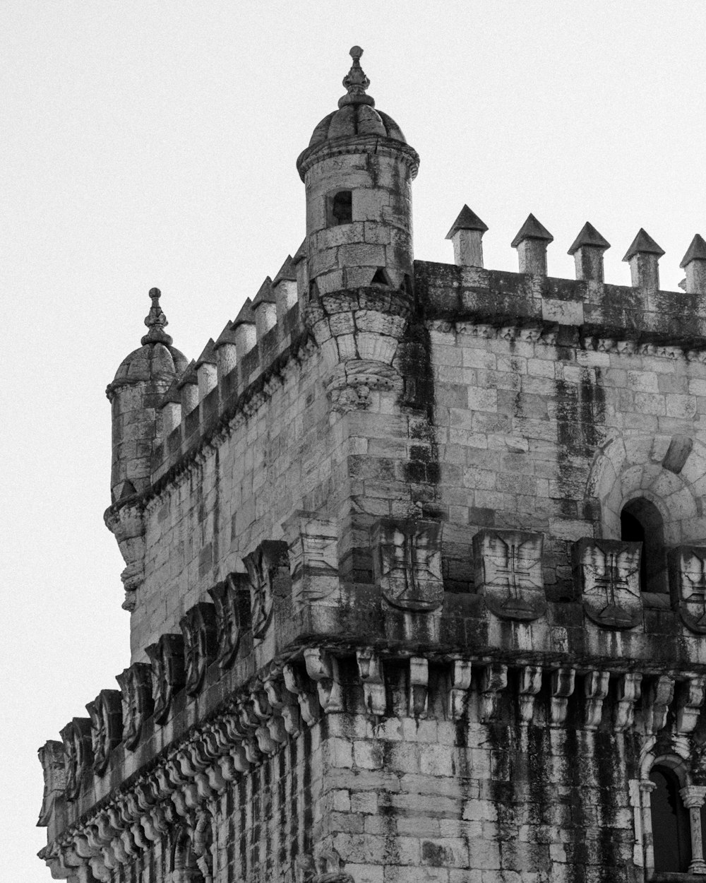 a black and white photo of a clock tower