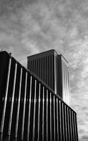 a black and white photo of a tall building