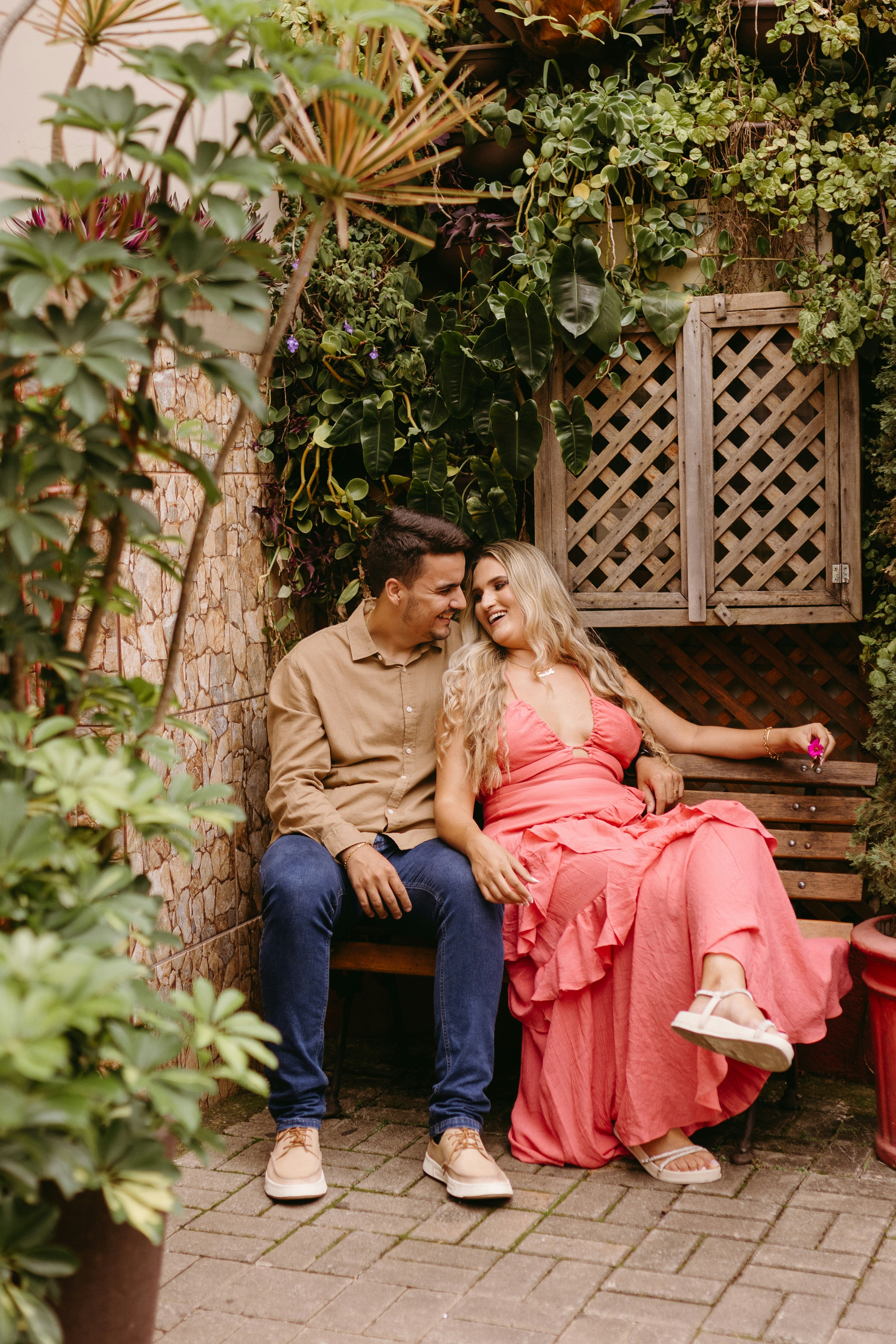 a man and a woman sitting on a bench