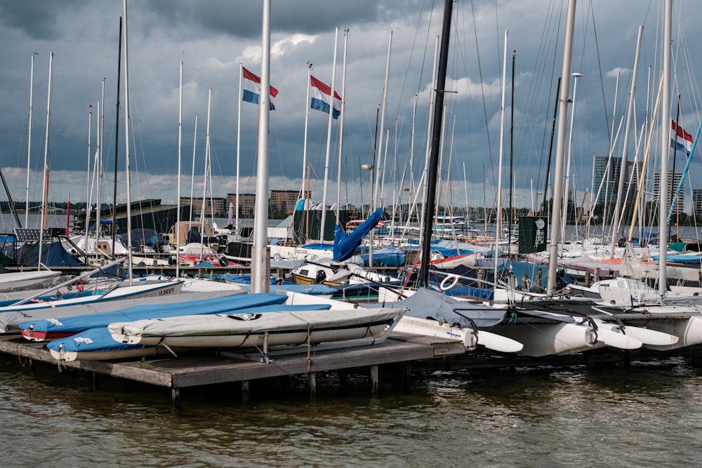 a bunch of boats that are sitting in the water