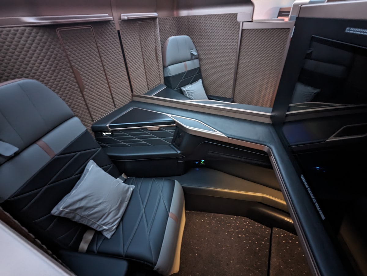 Business class airplane cabin with premium seating