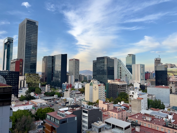 a view of a city with tall buildings