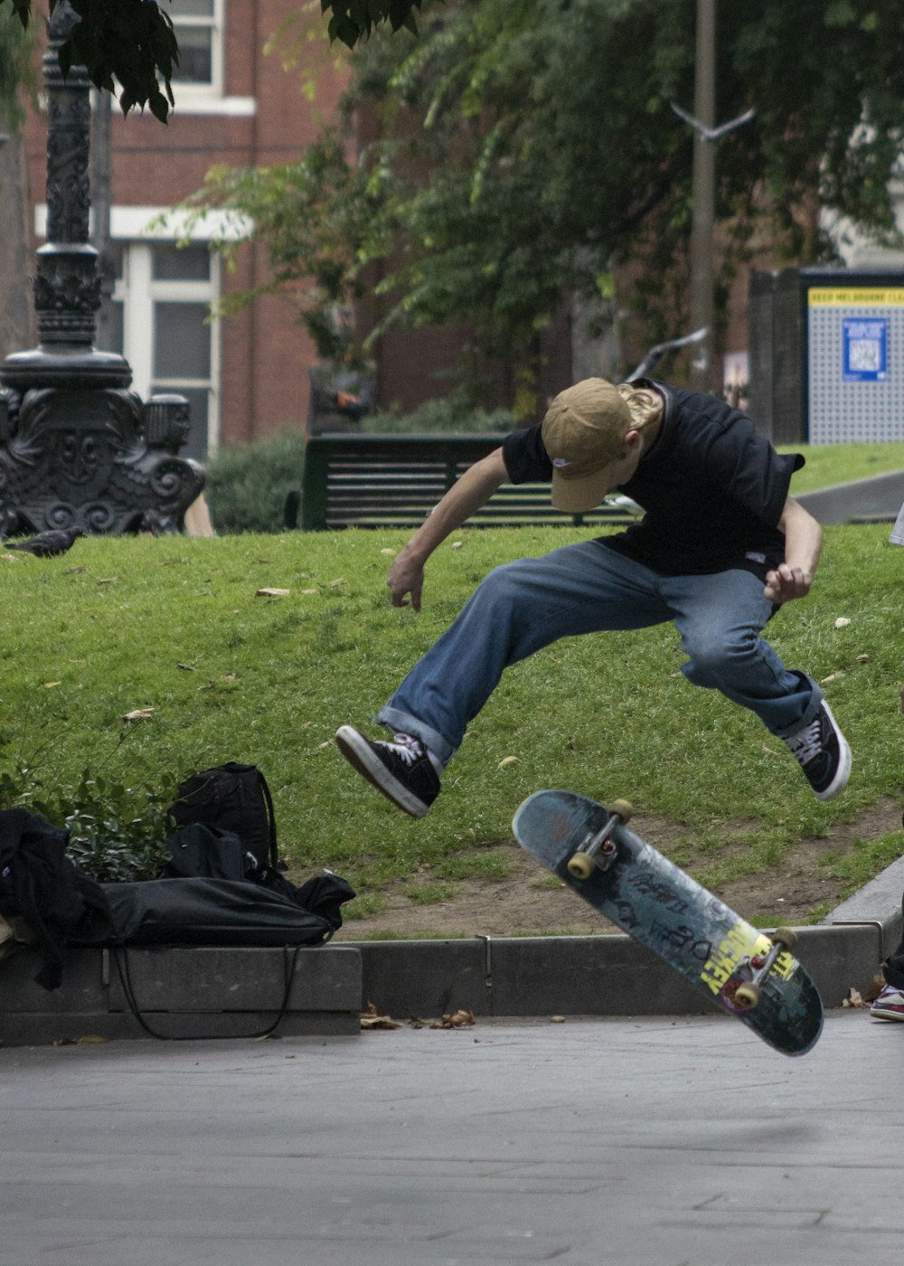 a man flying through the air while riding a skateboard