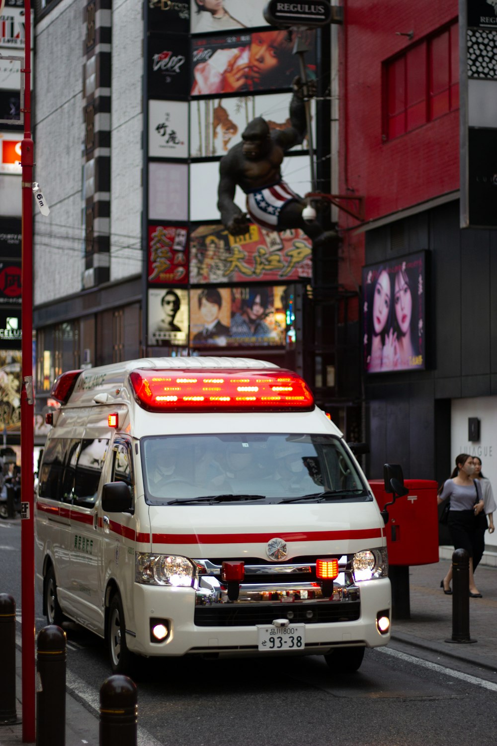 an ambulance is parked on the side of the road