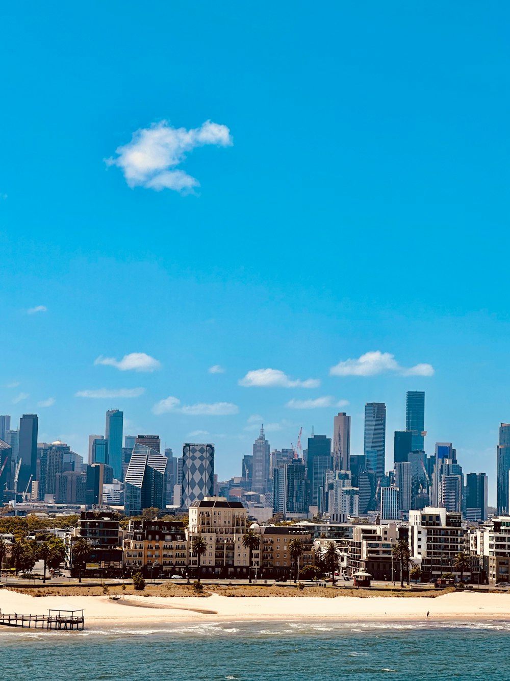 a view of a city from the ocean