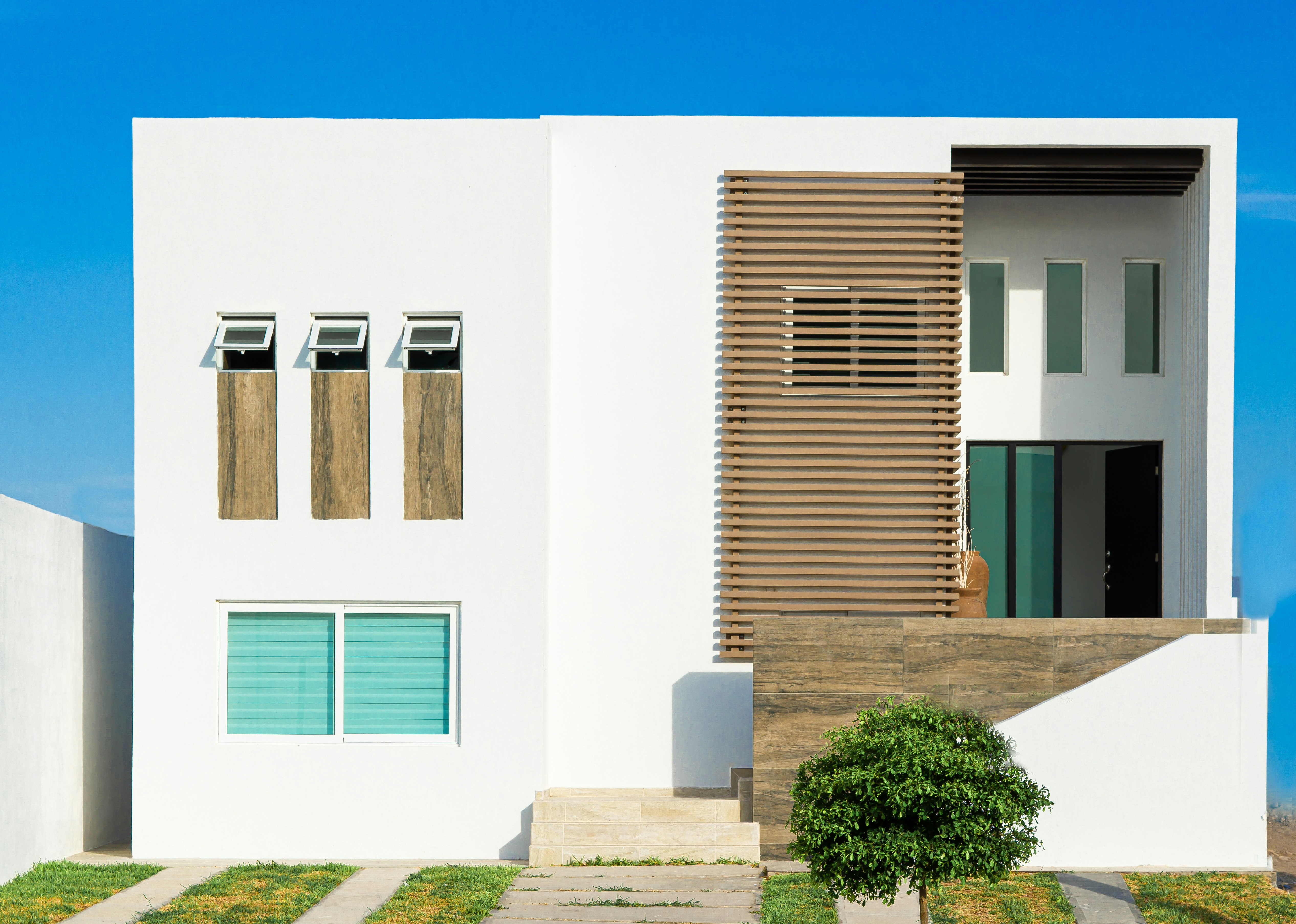 White house with tree