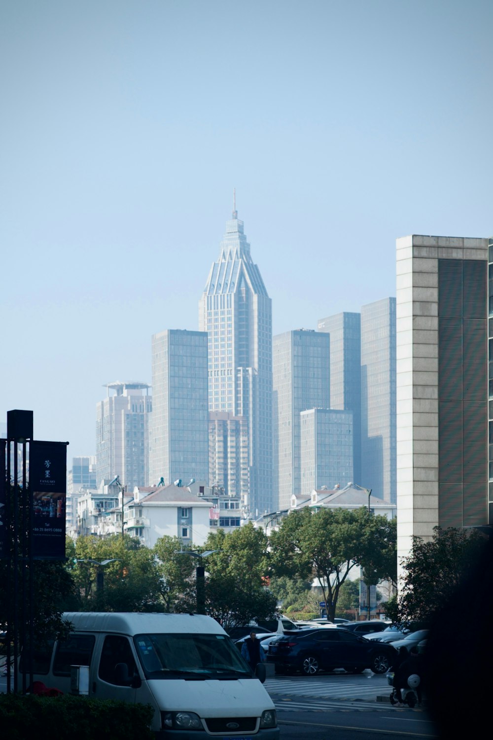 a view of a city from a parking lot