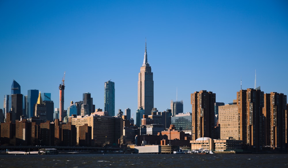 a view of a large city with tall buildings