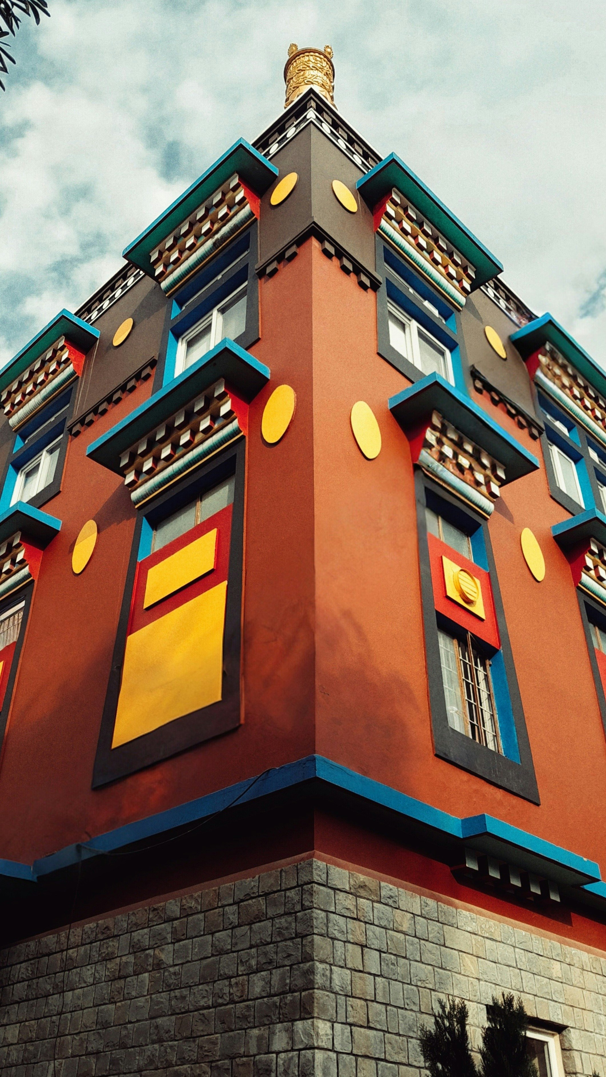 a tall building with a clock on the top of it