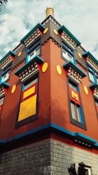 a tall building with a clock on the top of it