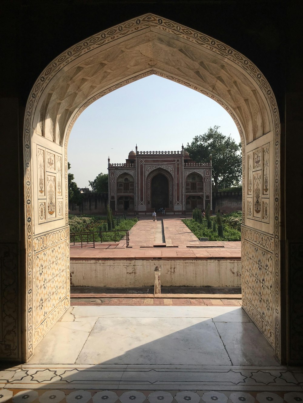 a view of a building through an archway