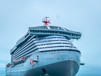 a large cruise ship docked in the water
