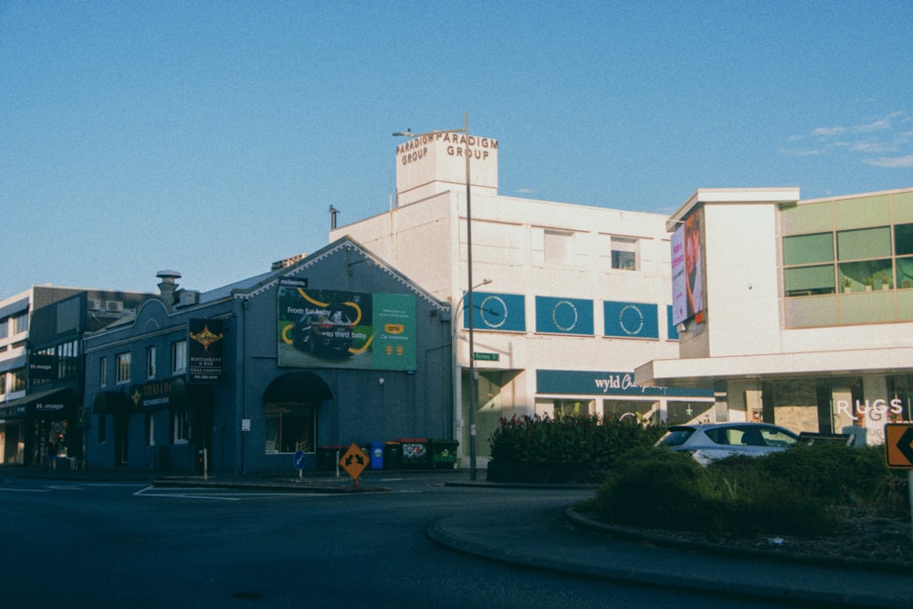 a street corner with a building on the corner